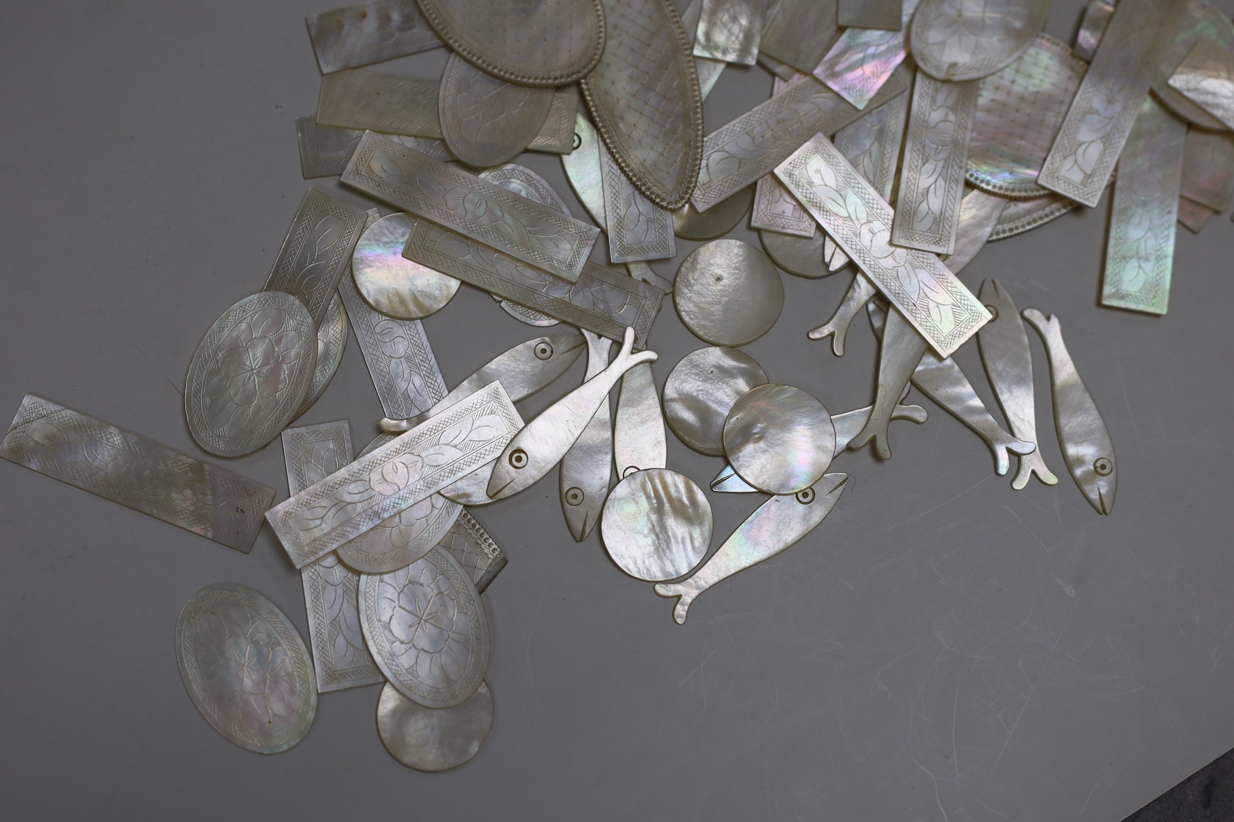 A box of Chinese mother of pearl gaming counters including crested examples with JRB monogram